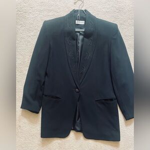 Not available til April

Ladies tuxedo style pantsuit